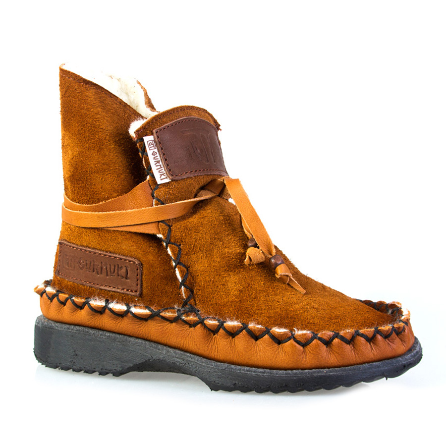 Gurmuki sheepskin ugg boots brown Sheep's Wool TRIBAL Handmade Ankle Boots are made of 100 % Leather Suede and Leather, 100% Sheep's wool lined throughout the boot including the foot bed with a 100% TR Rubber Sole. This Original design is Stylish and Functional able to be worn with the collar up or folded over to show the luxurious sheep's wool lining. In the Native American Indian Moccasin Boots Style, it is Unique, Stylish and Durable, not to mention Comfortable like wearing your slippers outside ! All Gurmuki Products are Handmade with Love, Proudly South African !